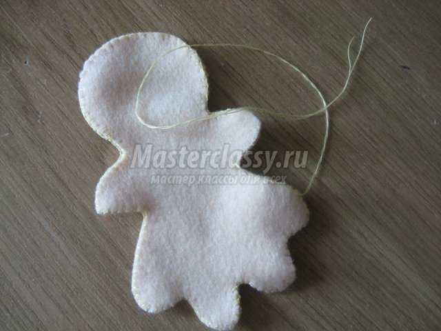 Текстильная куколка с вышивкой бисером